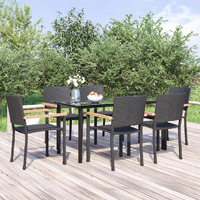  7 Piece Garden Dining Set Black Poly Rattan