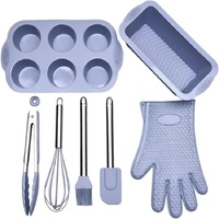 Grey 7-Piece Silicone Bakeware Set with Whisk, Spatula, Brush, Gloves, and Cake Molds for Home Baking